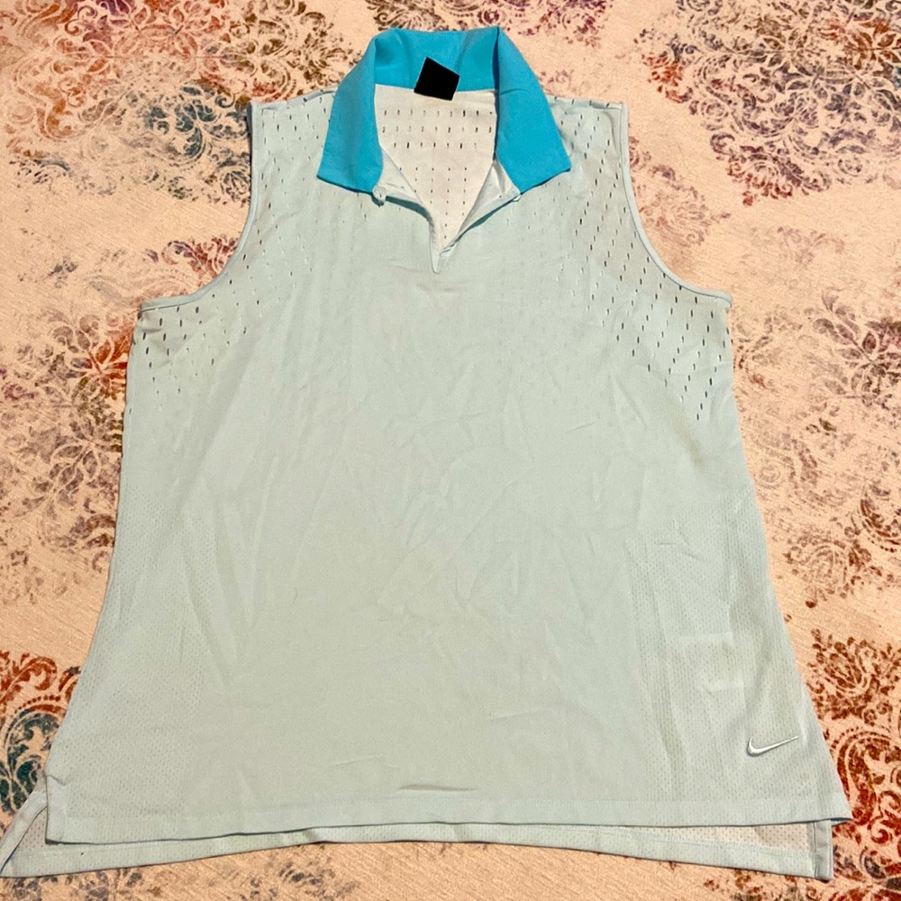Womens sleeveless golf/tennis shirt. Size L. Nike.